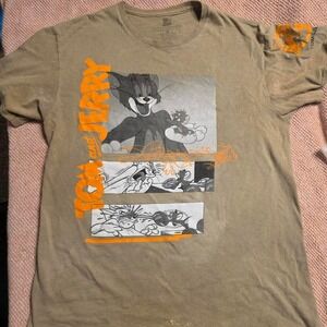 Tom & Jerry graphic tee with bold orange accents